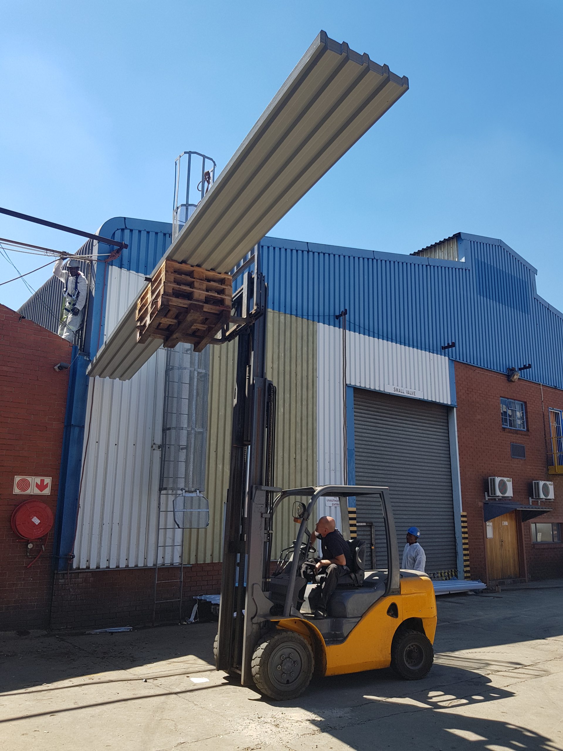 Hoisting Roofing Tiles for Asbestos Removal
